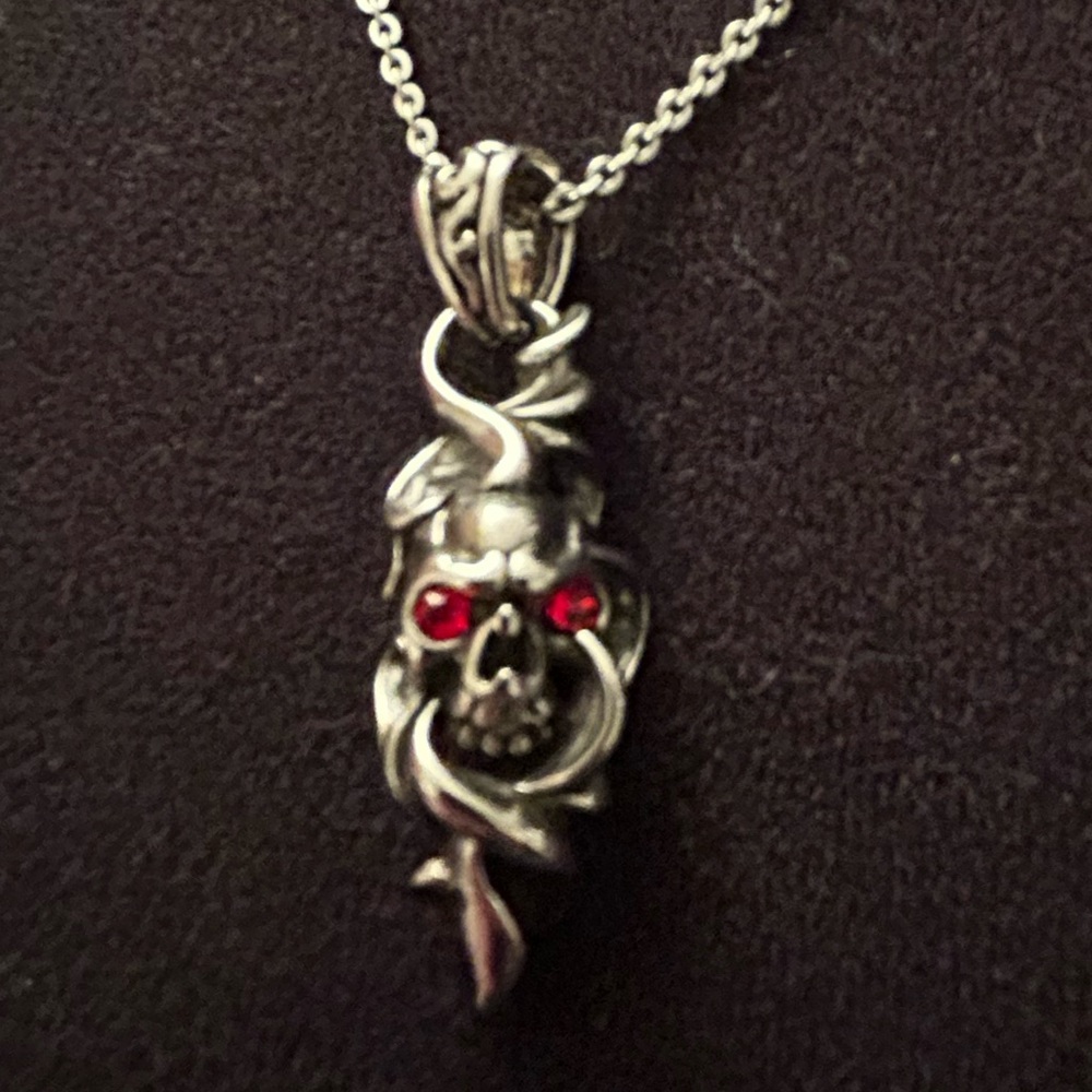 Artistic Designed Skelton Head with Red Eyes,
Brand New